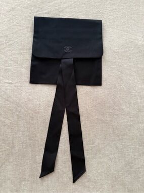 CHANEL Black fabric with glitter CC pouch